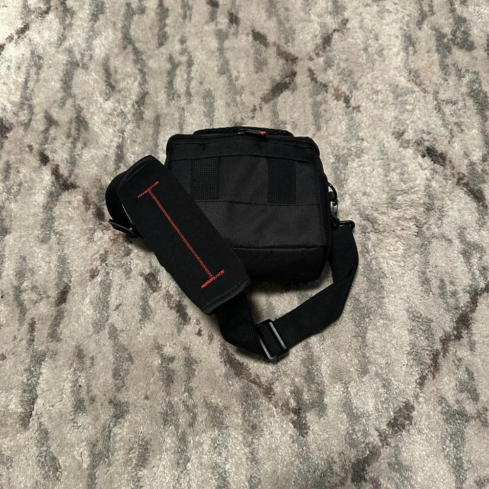 Canon Rebel Camera with Black and Red Case